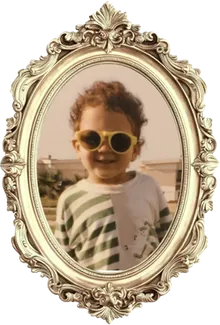 Abdelrahman as a child, in a gilded oval frame